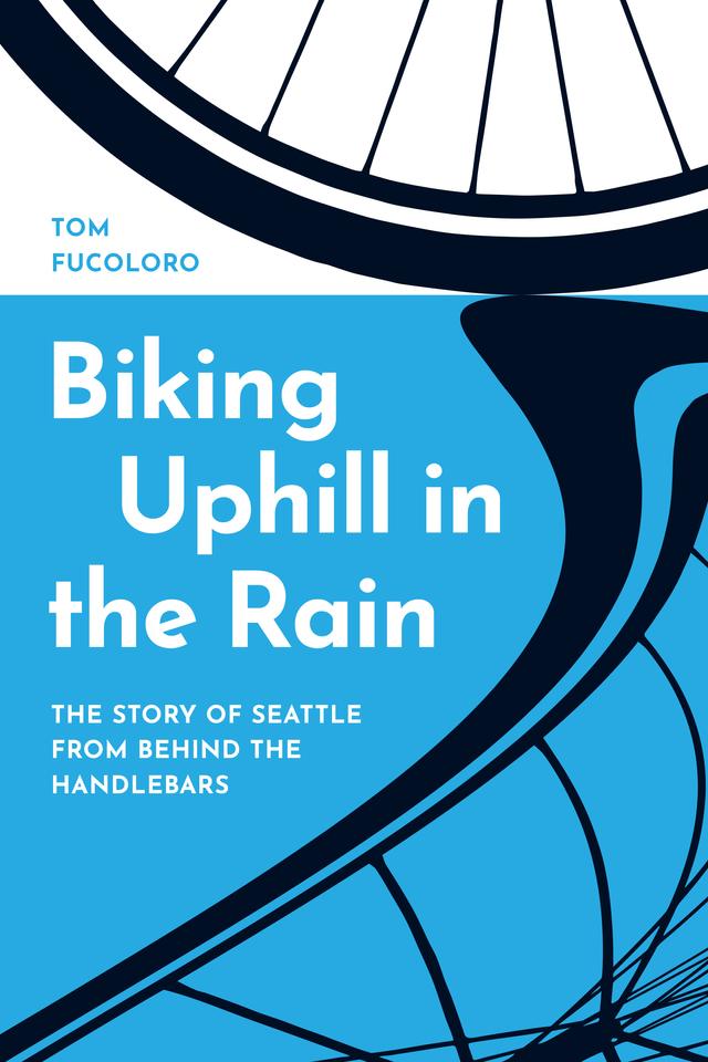 Biking Uphill in the Rain by Tom Fucoloro
